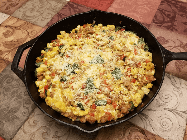 fresh cauliflower, Italian turkey sausage, olive oil, onion, roasted red peppers, eggs, egg whites, salt, black pepper, fresh basil leaves, romano cheese