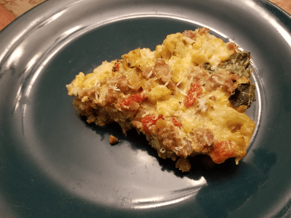 fresh cauliflower, Italian turkey sausage, olive oil, onion, roasted red peppers, eggs, egg whites, salt, black pepper, fresh basil leaves, romano cheese